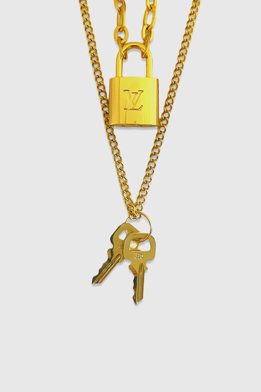 Comment être sûre que votre pendentif cadenas Louis Vuitton est authen –  theluxurystory